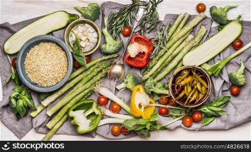 Various ingredients for tasty vegetarian cooking with organic vegetables, pearl barley and feta cheese, top view. Healthy clean food or diet nutrition concept
