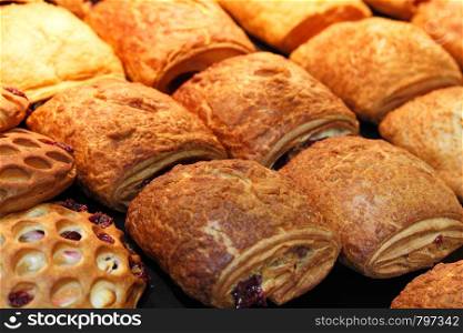 Various kinds of pastry pies made of flaky dough.