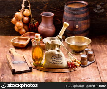 various kitchen utensils on rustic wooden background