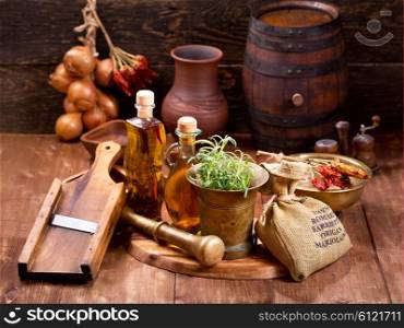 various kitchen utensils on rustic wooden background