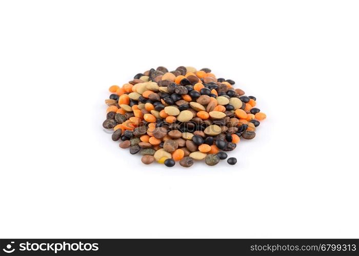 Various lentils mix on a white background