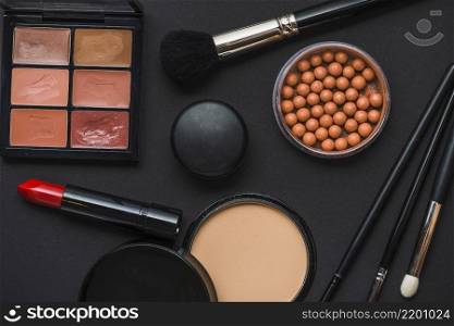 various makeup products black background