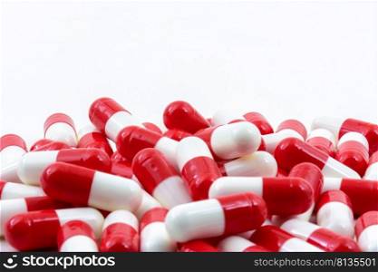 Various medicine pills on white background with free space. Close up of various pills on white background