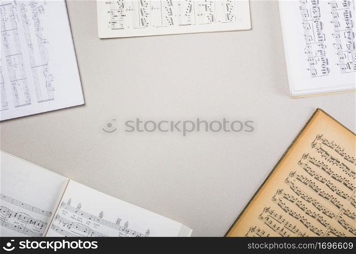 various musical note books white background with space text