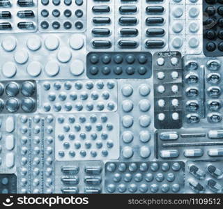 Various pills. Background or texture. Toned