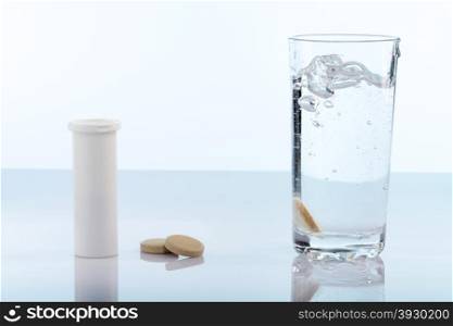 Various pills,box and bottle on white background
