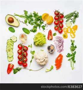 Various salad vegetables ingredients on white background, top view, flat lay. Healthy clean eating or diet food concept.