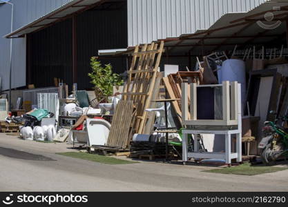 Various scrap items and materials collected for sale as second hand. environmental awareness