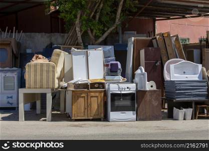 Various scrap items and materials collected for sale as second hand. environmental awareness
