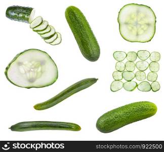 various sliced and whole raw cucumbers isolated on white background