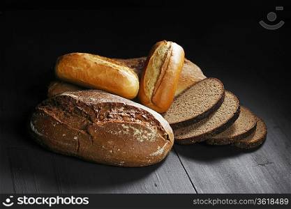 Various sliced bread on table