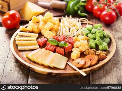 various sorts of cheese on a plate