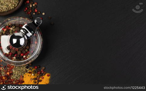 Various spices on stone table. Top view with copy space. Various spices on stone table