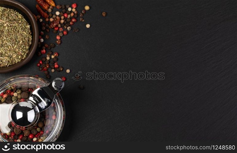 Various spices on stone table. Top view with copy space. Various spices on stone table