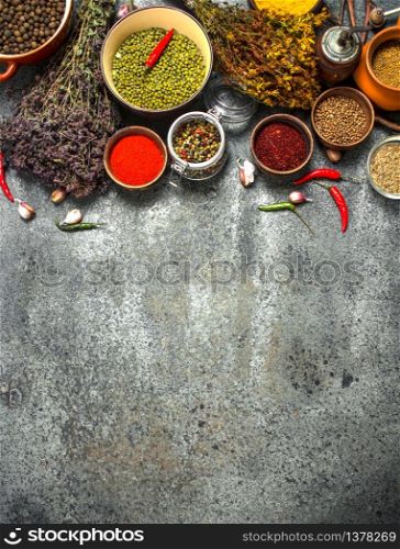 Various spicy spices and herbs. On a rustic background.. Various spicy spices and herbs.