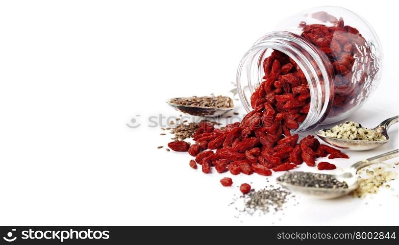 Various superfoods on white background. Healthy food, diet, vegetarian or clean eating concept.Background layout with free text space.