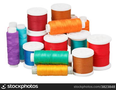 various thread bobbins isolated on white background