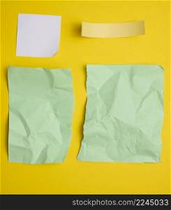 various torn pieces of paper on yellow background