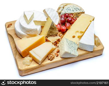 Various types of cheese - parmesan, brie, roquefort, cheddar on wooden cutting board. Various types of cheese - parmesan, brie, roquefort, cheddar