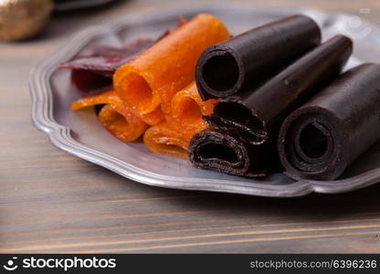 Various types of dry fruit leather close up. Dry fruit leather