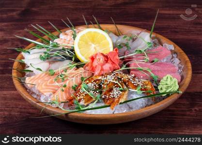 Various types of fish on a plate with ice and lemon. Various types of fish on plate with ice and lemon