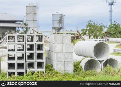 Various types of precast concrete for wells and drains in storage