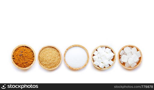 Various types of sugar on white background.