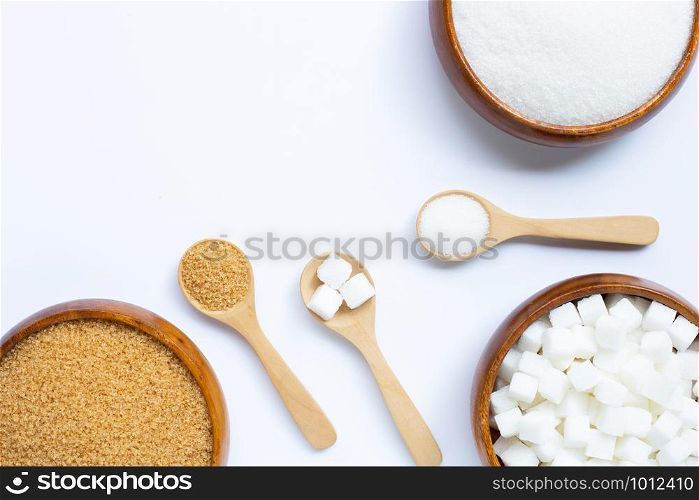 Various types of sugar on white background. Copy space