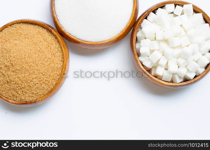 Various types of sugar on white background. Copy space