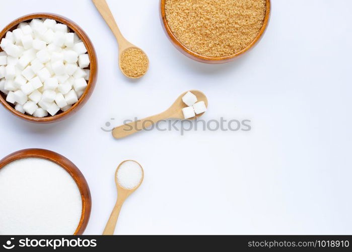 Various types of sugar on white background. Copy space