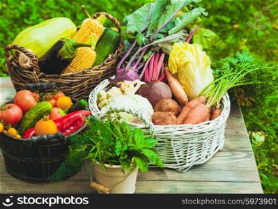 Various vegetables on a wooden table - healthy still life. Vegetables on wooden table