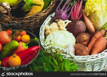 Various vegetables on a wooden table - healthy still life. Vegetables on wooden table