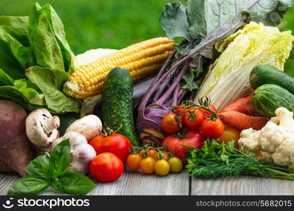 Various vegetables on a wooden table with copy space