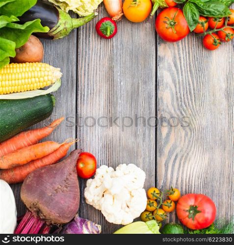 Various vegetables on a wooden table with copy space. Vegetables on wooden table