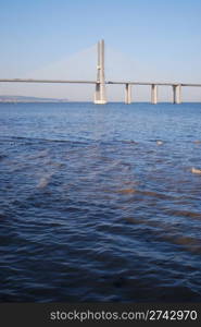 Vasco da Gama Bridge on vertical water view