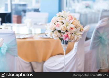 Vase of flowers, ornamental flowers in the wedding, decorate the banquet in the hotel of the wedding.