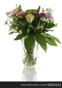 vase with bouquet of different flowers isolted on white