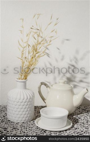 vase with dry wheat cup coffee 2