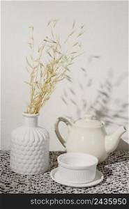 vase with dry wheat cup coffee 2