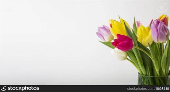 vase with tulips close up. Beautiful photo. vase with tulips close up