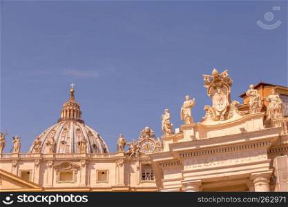 Vatican City in Rome. Detail of Saint Peter Church Cupola on top of Bernini colonnade