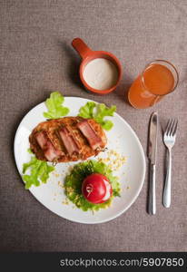 veal meat with bacon. roast of veal meat with bacon with potatoes