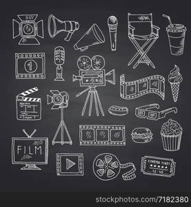 Vector cinema doodle icons on black chalkboard illustration. Film entertainment drawing, media cinematography. Vector cinema doodle icons on black chalkboard illustration