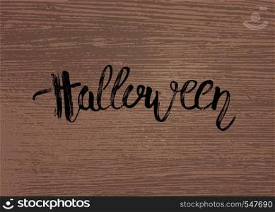Vector Halloween handwritten brush lettering on dark wood texture. Holiday slogan for decoration.