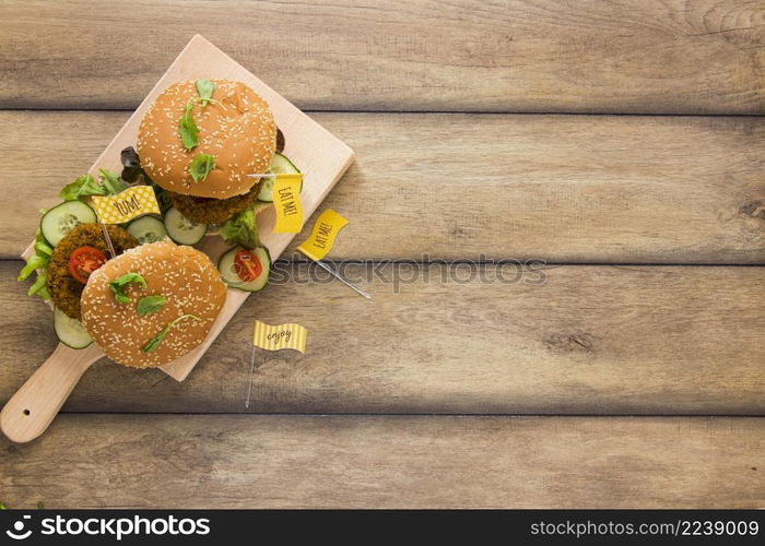 vegan burgers wooden board with copy space