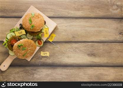vegan burgers wooden board with copy space