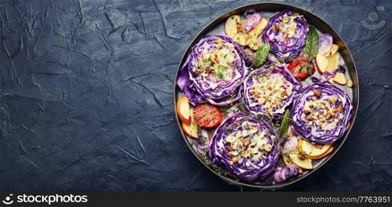 Vegan dish of red cabbage, apples and nuts. Healthy appetizer.. Vegetable vegan red cabbage appetizer.