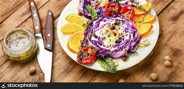 Vegan dish of red cabbage, orange and nuts. Healthy appetizer.. Vegetable vegan red cabbage appetizer.