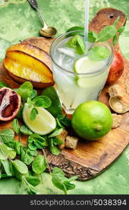 vegan juice for healthy lifestyle. refreshing drink with fresh lime,orange, mint and averrhoa