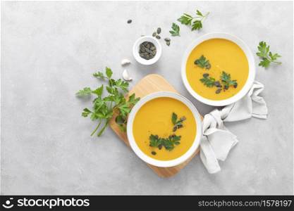 Vegan pumpkin soup with garlic and parsley